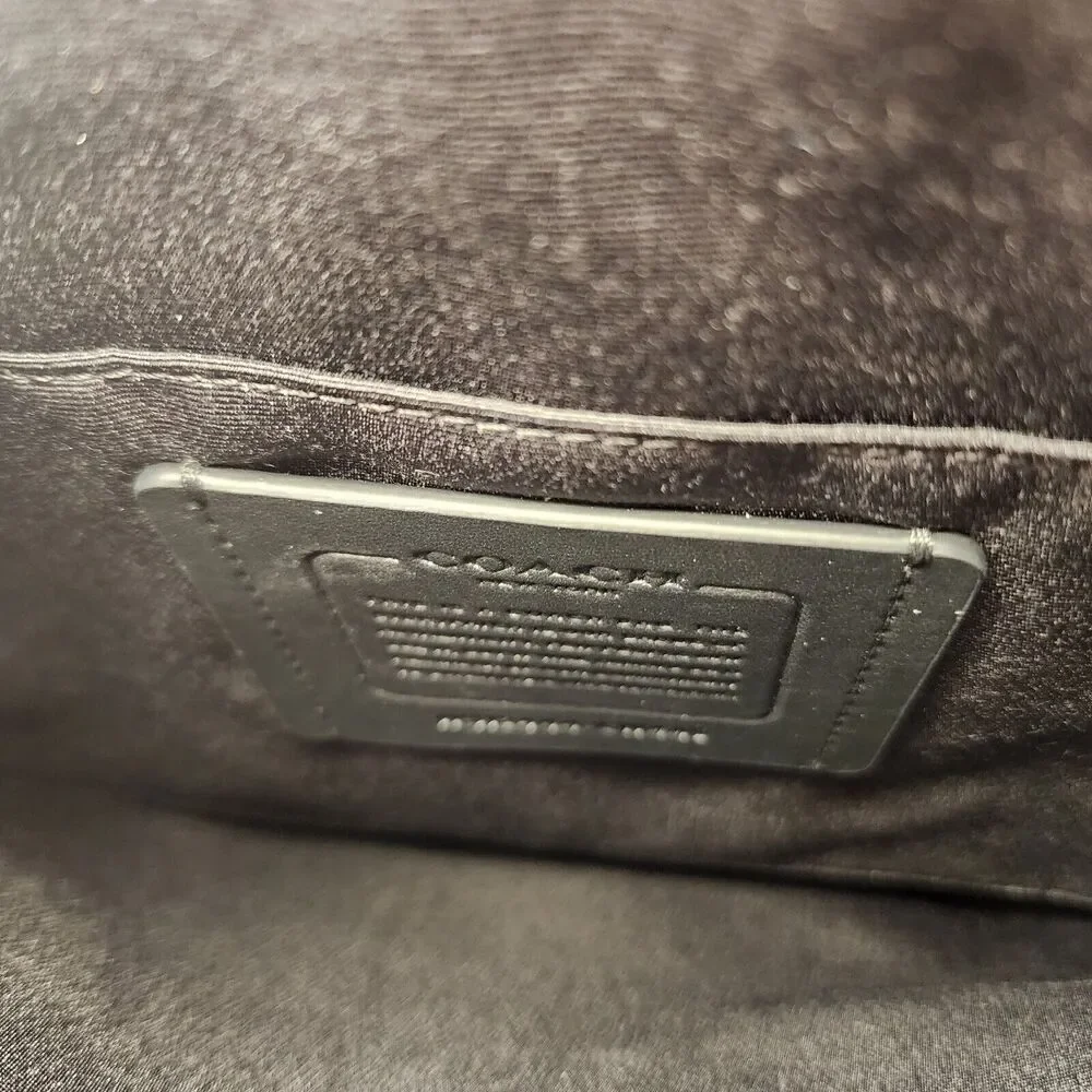 Coach carrier zip